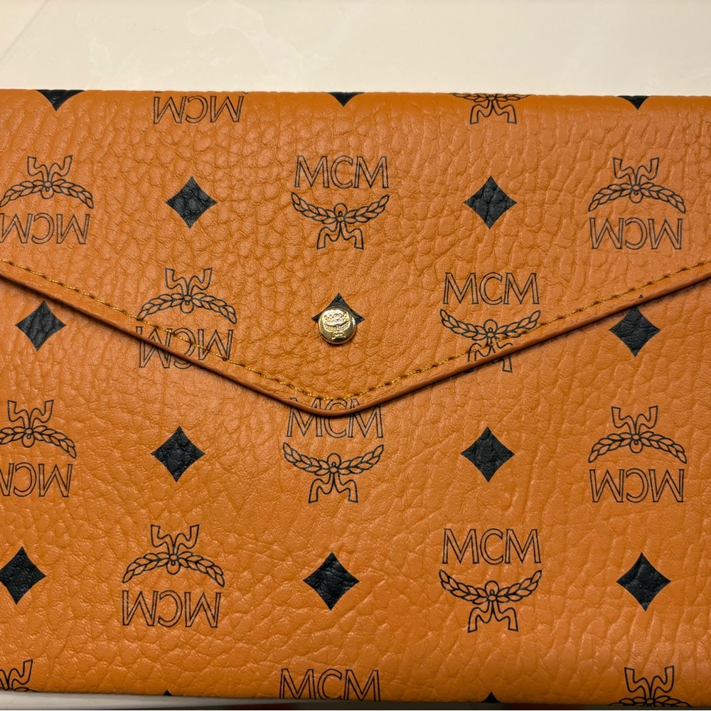 MCM Signature Orange Clutch with Black Accents